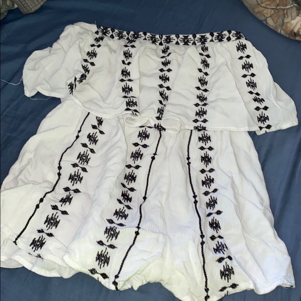 White romper with navy blue pattern